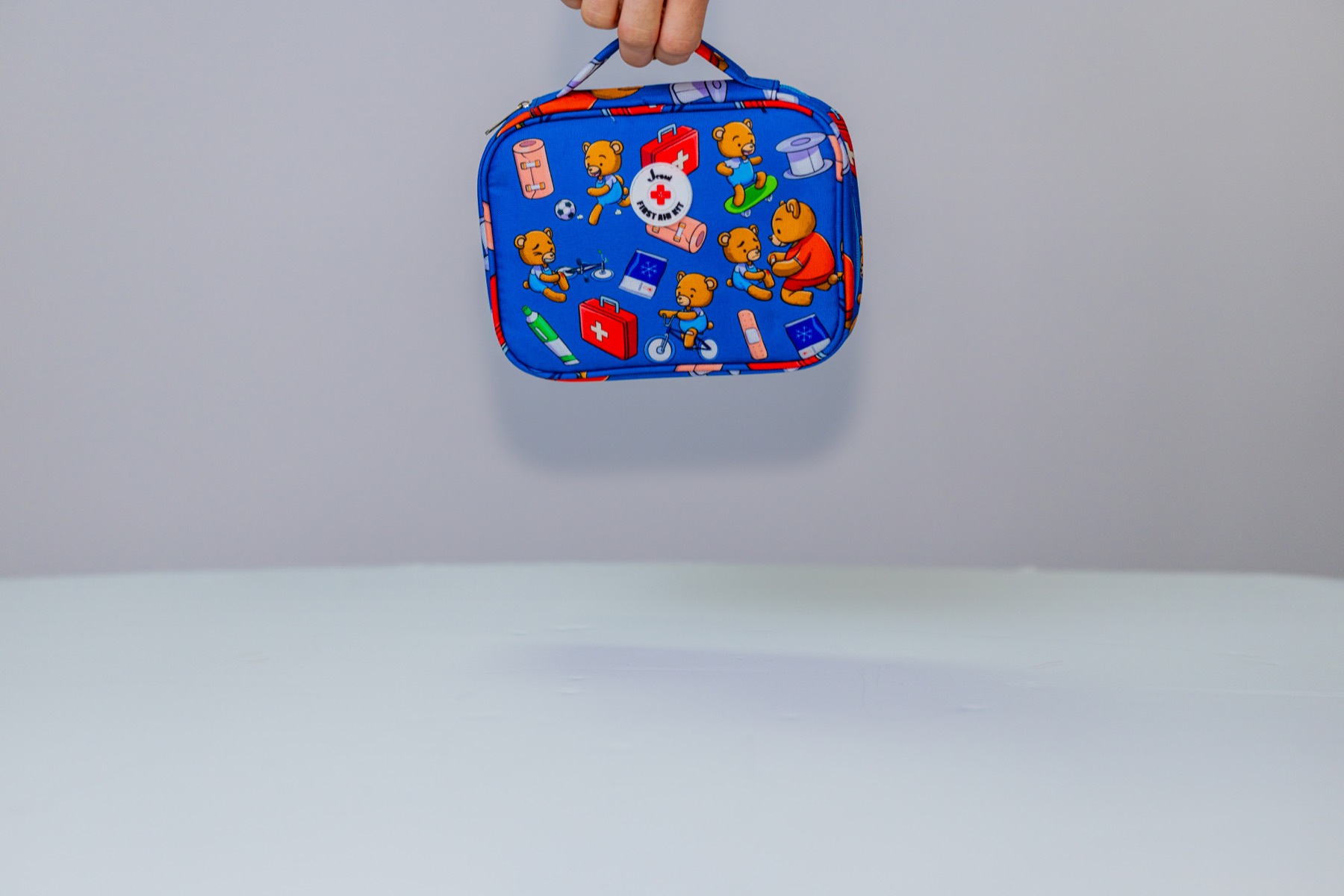 Family Kit held for scale